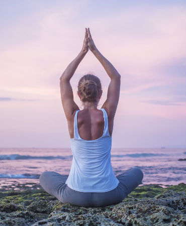 caucasian-woman-practicing-yoga